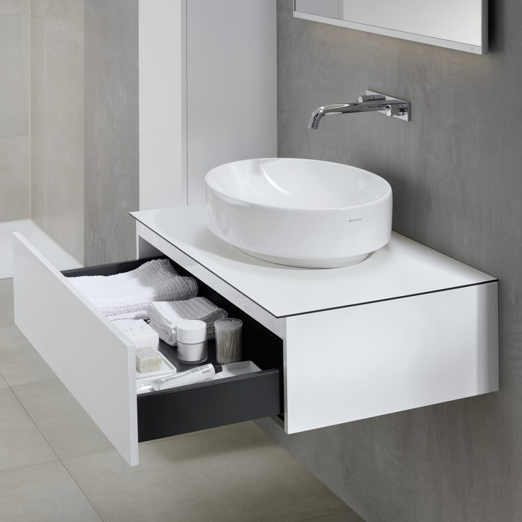 VariForm ellipse lay-on washbasin with bathroom furniture in white colour. VariForm ellipse lay-on washbasin with bathroom furniture in white colour.