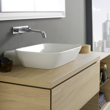 Washplace with Geberit ONE lay-on washbasin and bathroom furniture made of wood