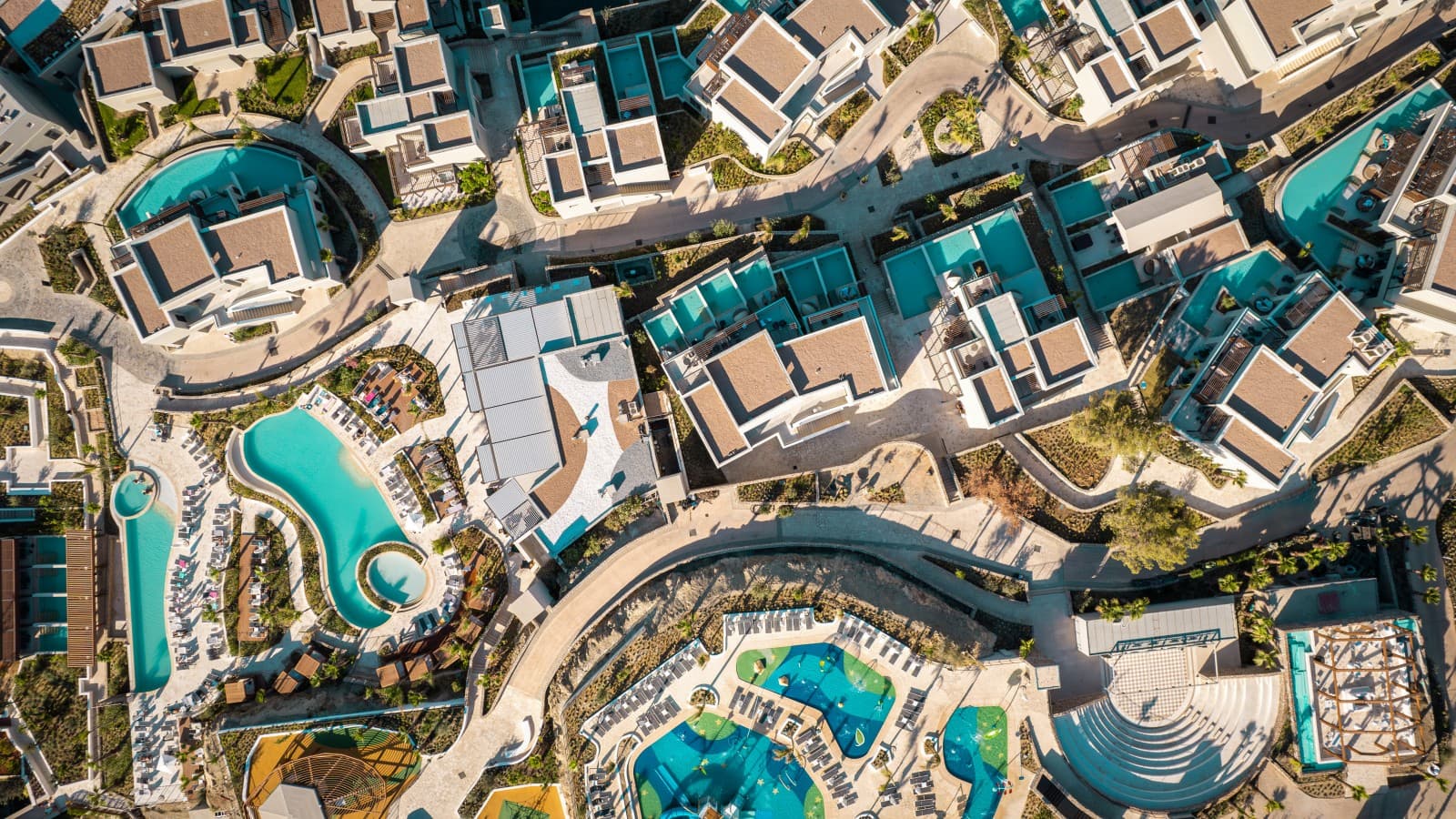 Pool scapes, social and hotel buildings from a bird's perspective.