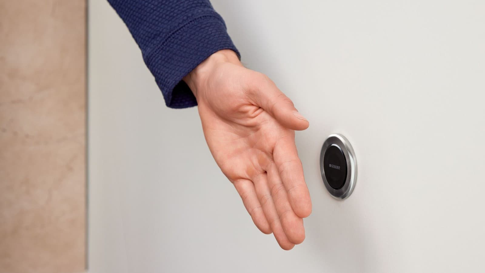 Touchless Geberit Typ10 remote flush actuation, round, with hand Touchless Geberit Typ10 remote flush actuation, round, with hand