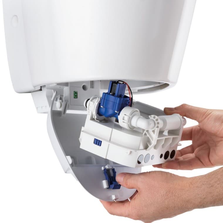 Module de commande d’urinoir Geberit dans sa station d’accueil Module de commande d’urinoir Geberit dans sa station d’accueil